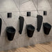 Fino Wall Hung Urinal Matte Black Rear Water Inlet Recessed in Public Washroom