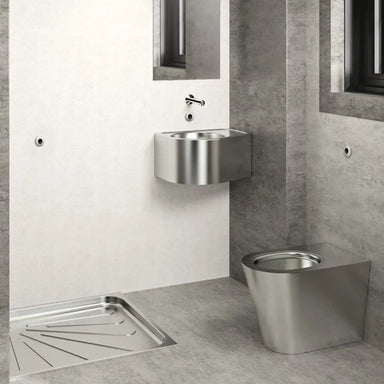 A image showing the Delabie S21 P TC floor standing WC pan installed in a washroom